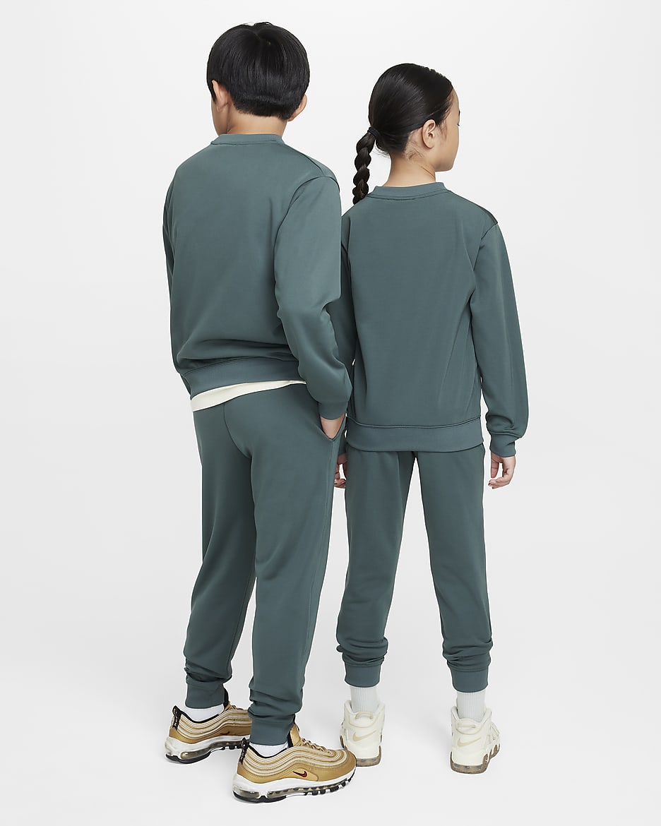 Nike green tracksuit junior hotsell